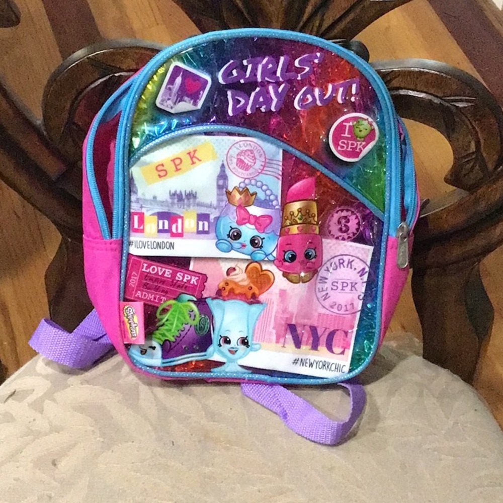 Shopkins mini backpack, gently used with lite stains on the back straps.